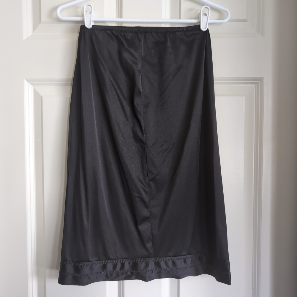 Vintage black nylon midi slip skirt with lace and decorative stitching trim